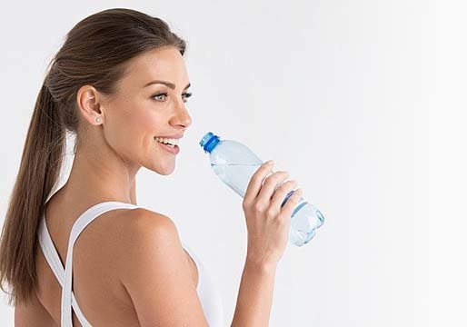 pngtree-woman-with-bottle-of-water-young-beautiful-fit-woman-drinking-water-image_1643062